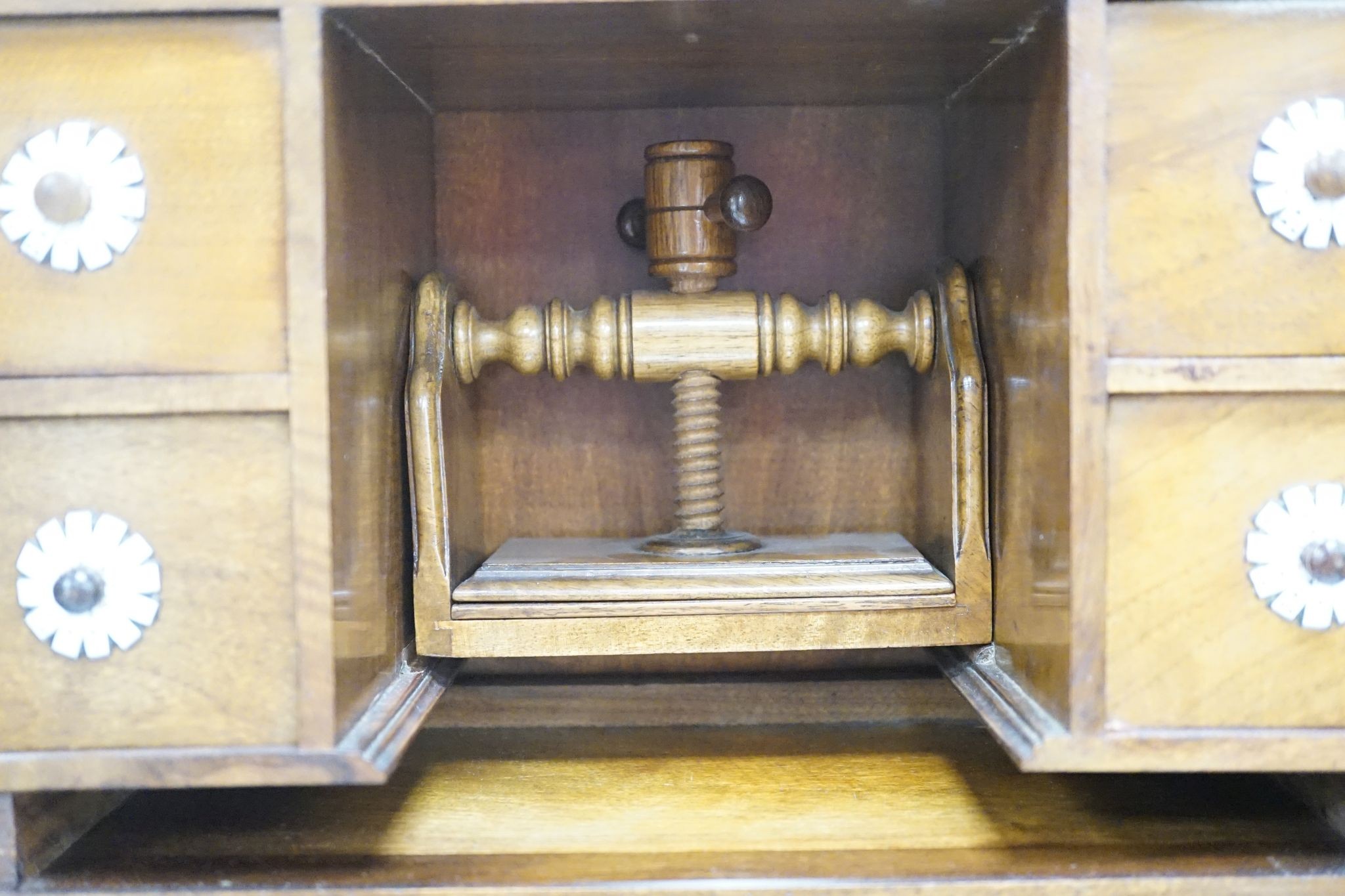 A late 19th century gilt metal mounted walnut games cabinet, W.40cm D.19cm H.49cm